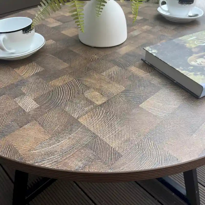Table basse ronde en bois et métal noir